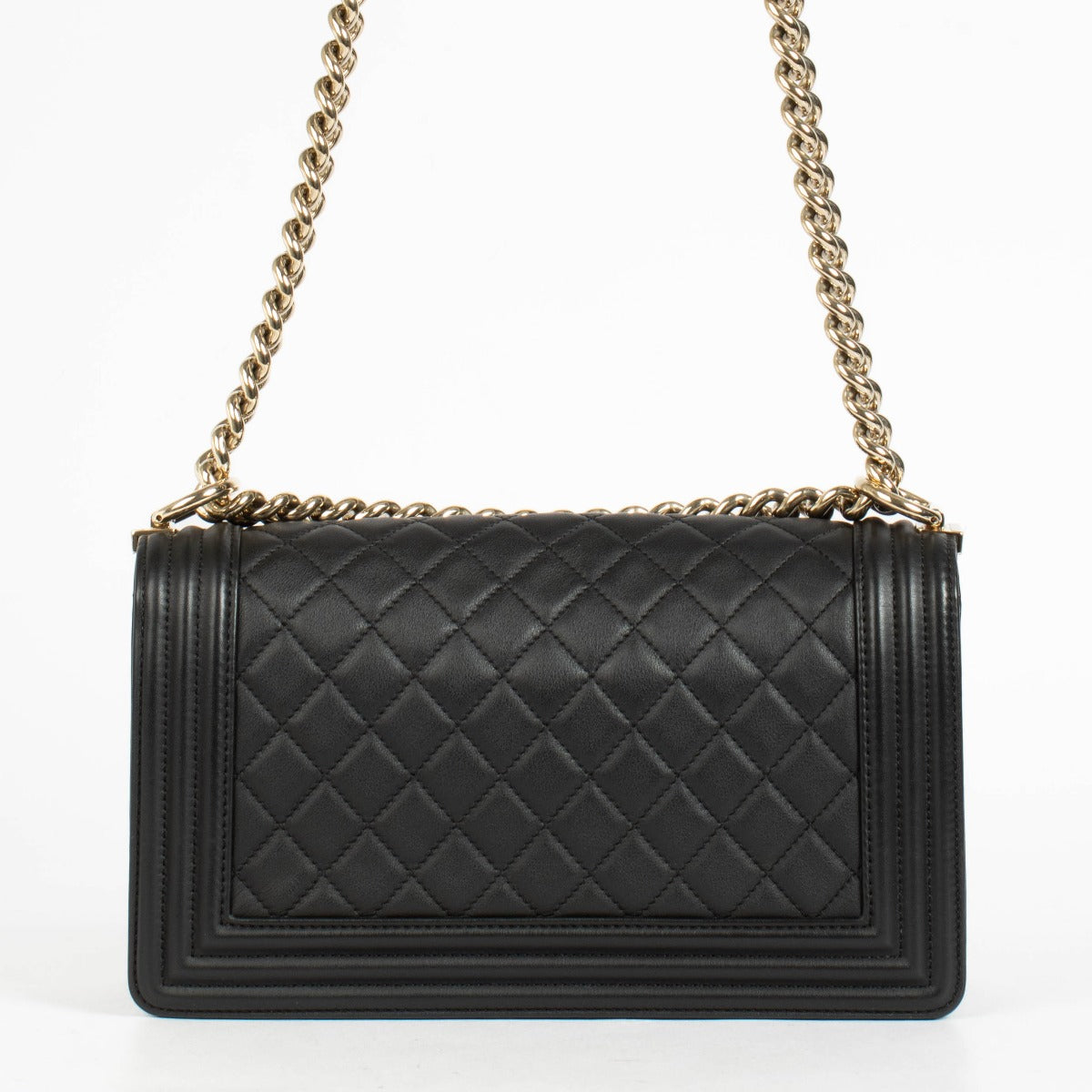 Authentic pre-loved Chanel Black Lambskin Medium Boy Shoulder Bag on Labellov.com
