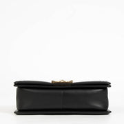Authentic pre-loved Chanel Black Lambskin Medium Boy Shoulder Bag on Labellov.com
