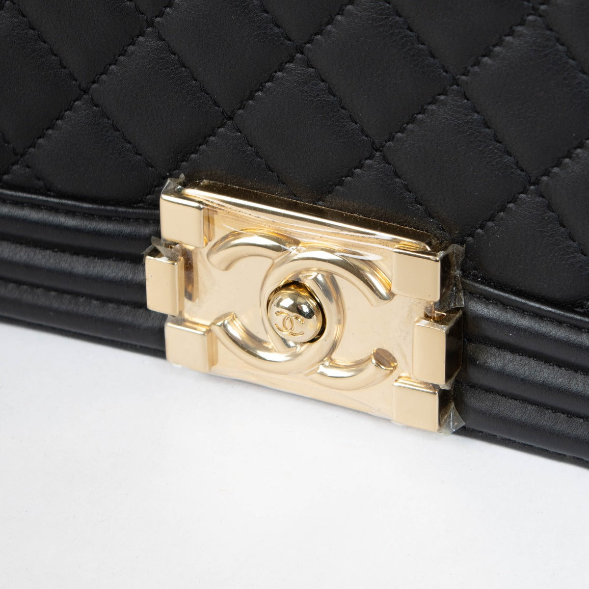 Authentic pre-loved Chanel Black Lambskin Medium Boy Shoulder Bag on Labellov.com