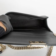 Authentic pre-loved Chanel Black Lambskin Medium Boy Shoulder Bag on Labellov.com