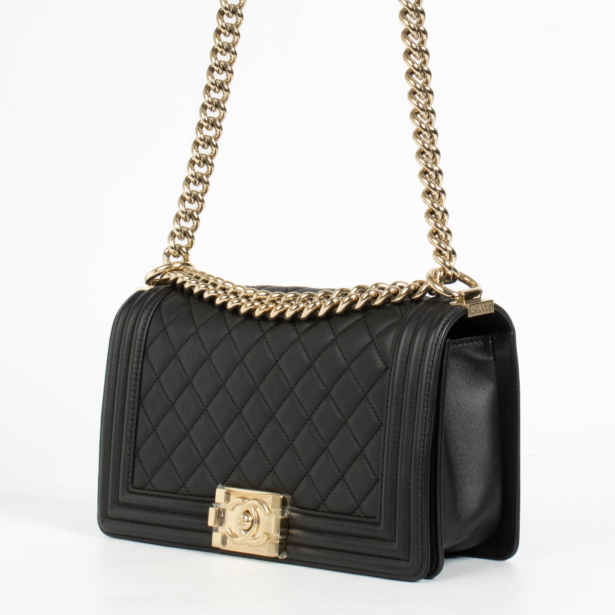 Authentic pre-loved Chanel Black Lambskin Medium Boy Shoulder Bag on Labellov.com