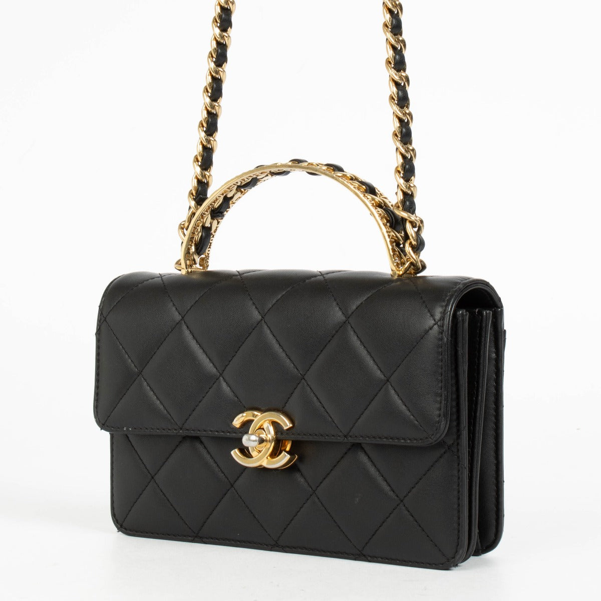 Authentic pre-loved Chanel Black Calfskin Mini Top Handle Flap Bag on Labellov.com