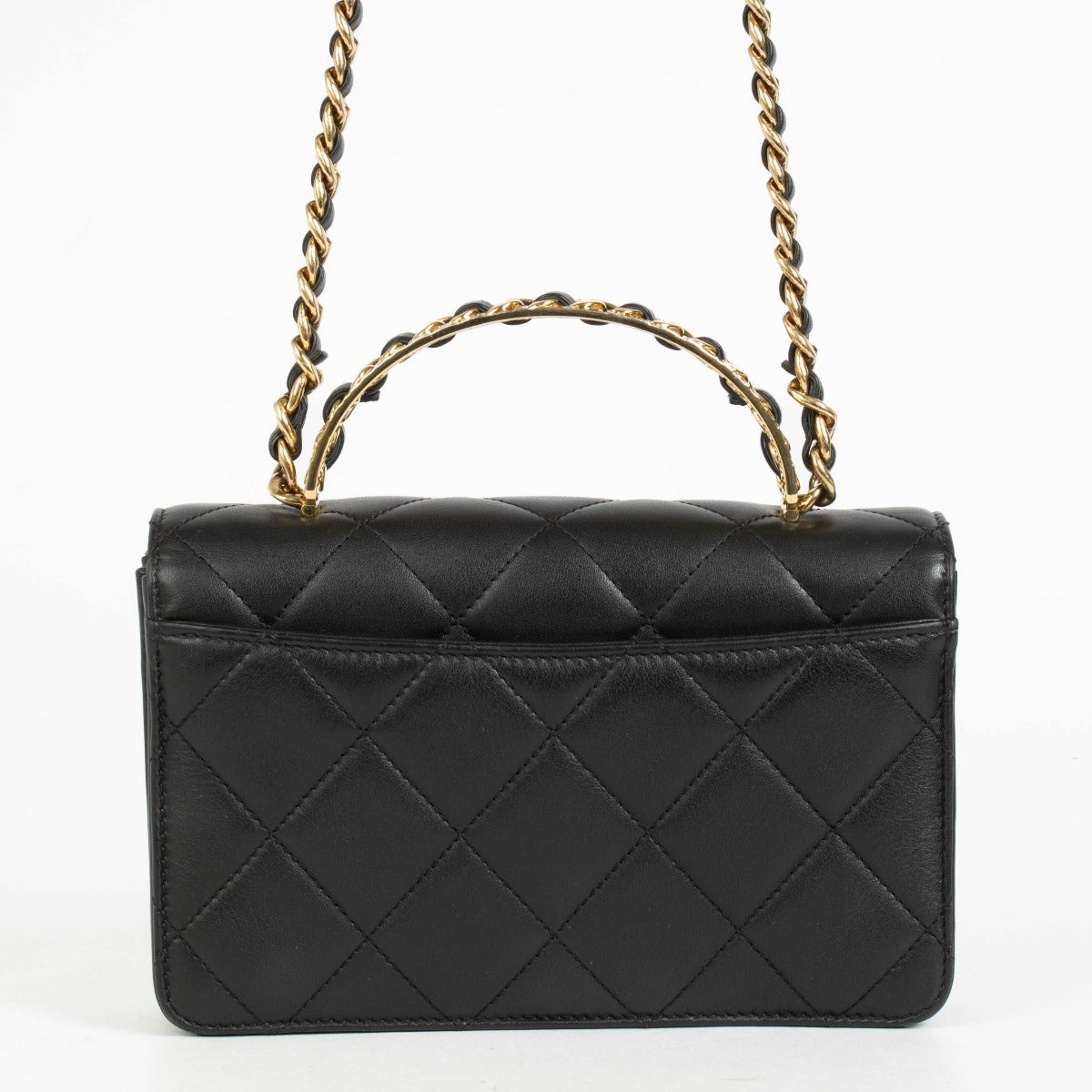 Authentic pre-loved Chanel Black Calfskin Mini Top Handle Flap Bag on Labellov.com