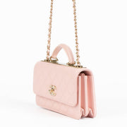 Shop this 100% authentic Chanel Pink Wallet On Chain Top Handle Bag at Labellov.com