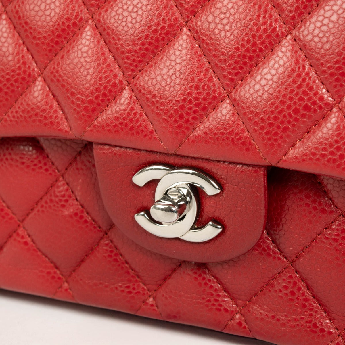 Authentic pre-loved Chanel Red Caviar Medium Classic 11.12 Bag on Labellov.com