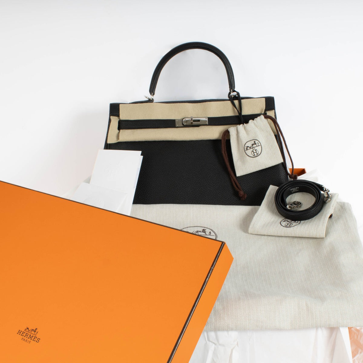 Authentic second hand luxury designer Hermès Kelly 35 Black Togo PHW
