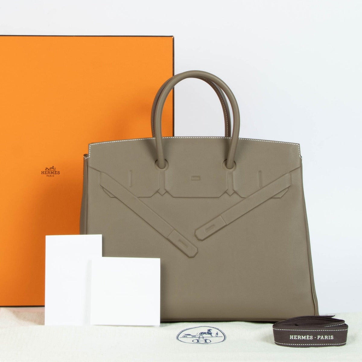 Authentic second hand brand new Hermès Shadow Birkin 35 Etoupe Swift PHW on www.labellov.com