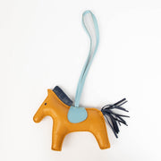 Authentic pre-loved Hermès Rodeo MM Milo Lambskin Grigri Horse Bag Charm Jaune D'or on Labellov.com