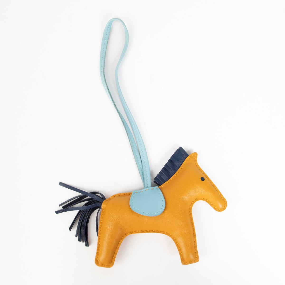 Authentic pre-loved Hermès Rodeo MM Milo Lambskin Grigri Horse Bag Charm Jaune D'or on Labellov.com