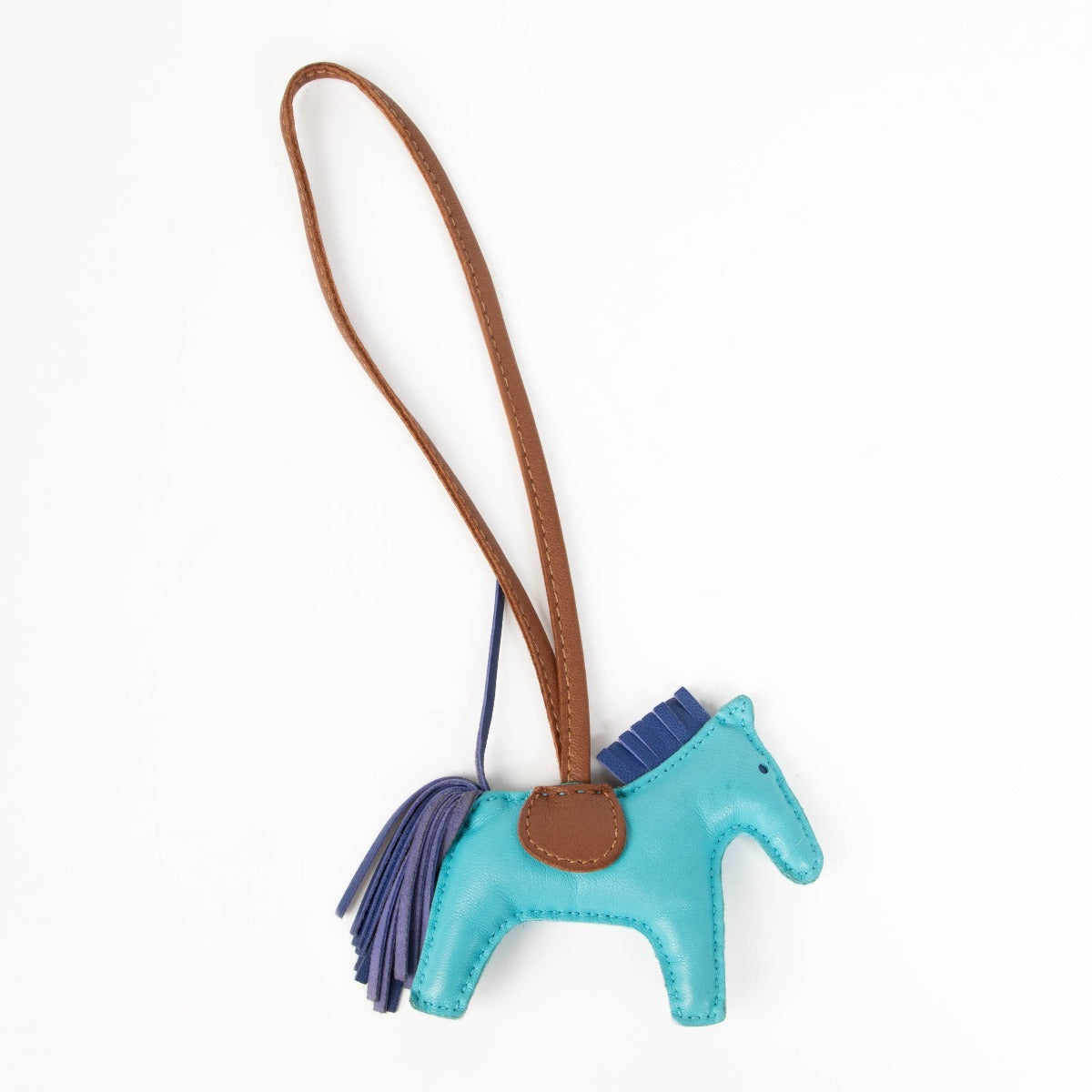 Authentic pre-loved Hermès Fauve Blue/Purple Rodeo PM Charm on Labellov.com
