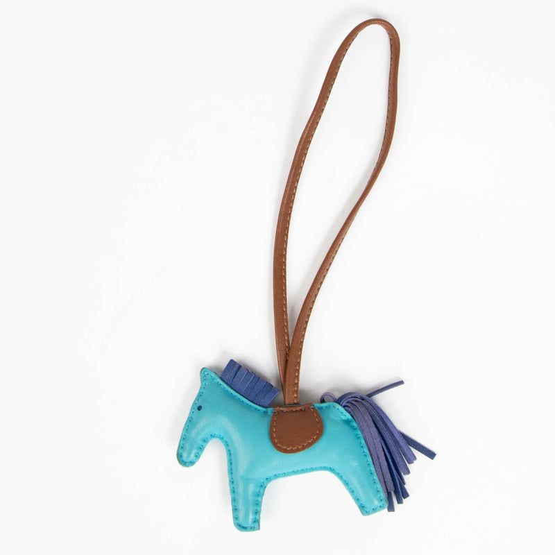 Authentic pre-loved Hermès Fauve Blue/Purple Rodeo PM Charm on Labellov.com