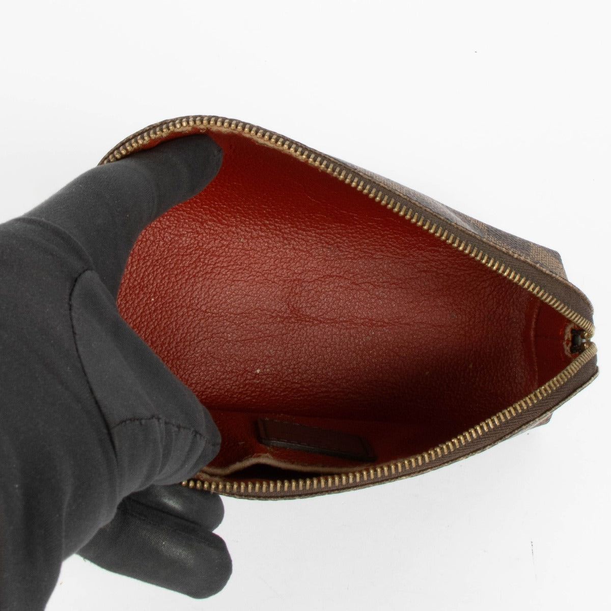Authentic pre-loved Louis Vuitton Damier Ebene Cosmetic Pouch PM on Labellov.com