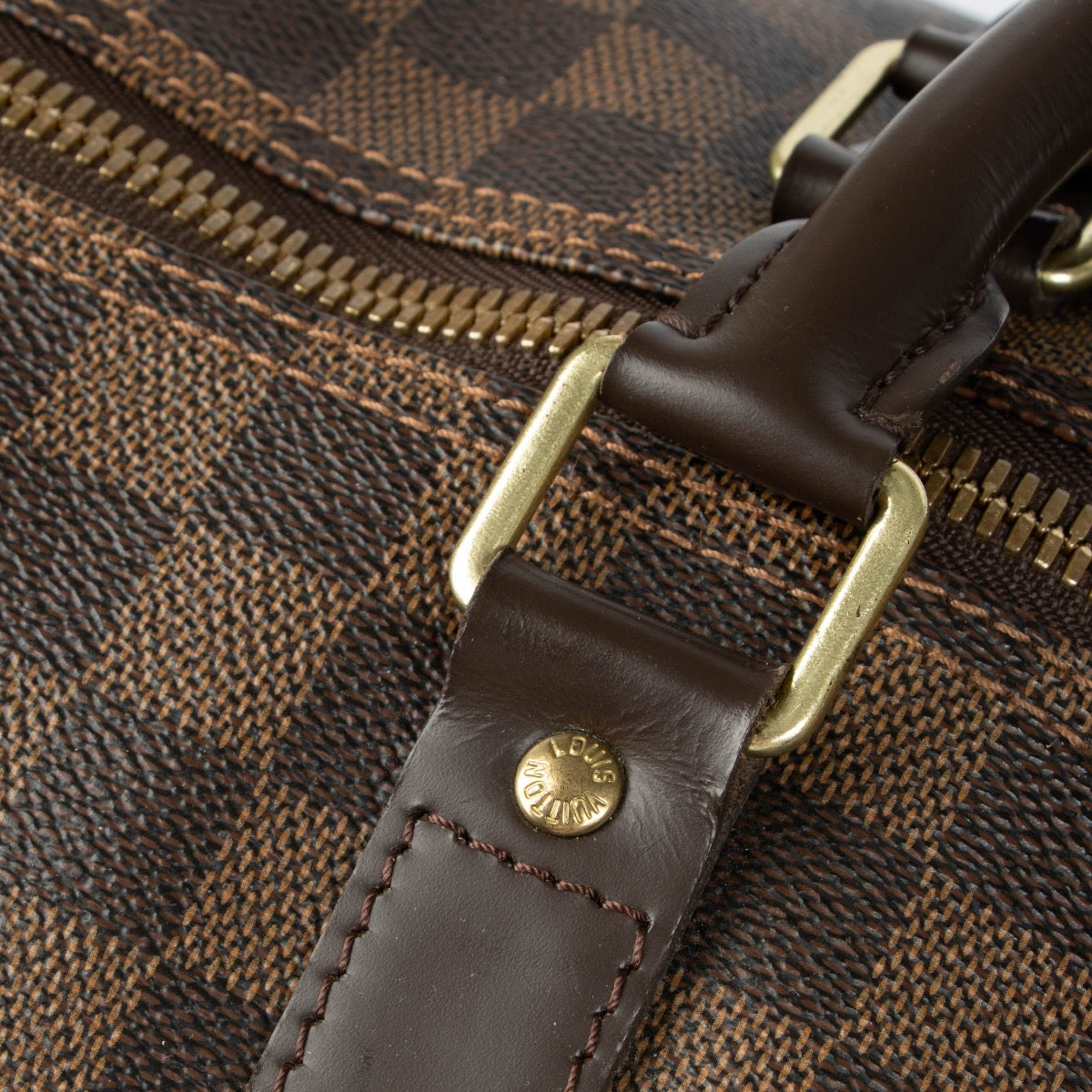 Authentic pre-loved Louis Vuitton Damier Ebene Keepall Bandoulière 55 Travel Bag on Labellov.com