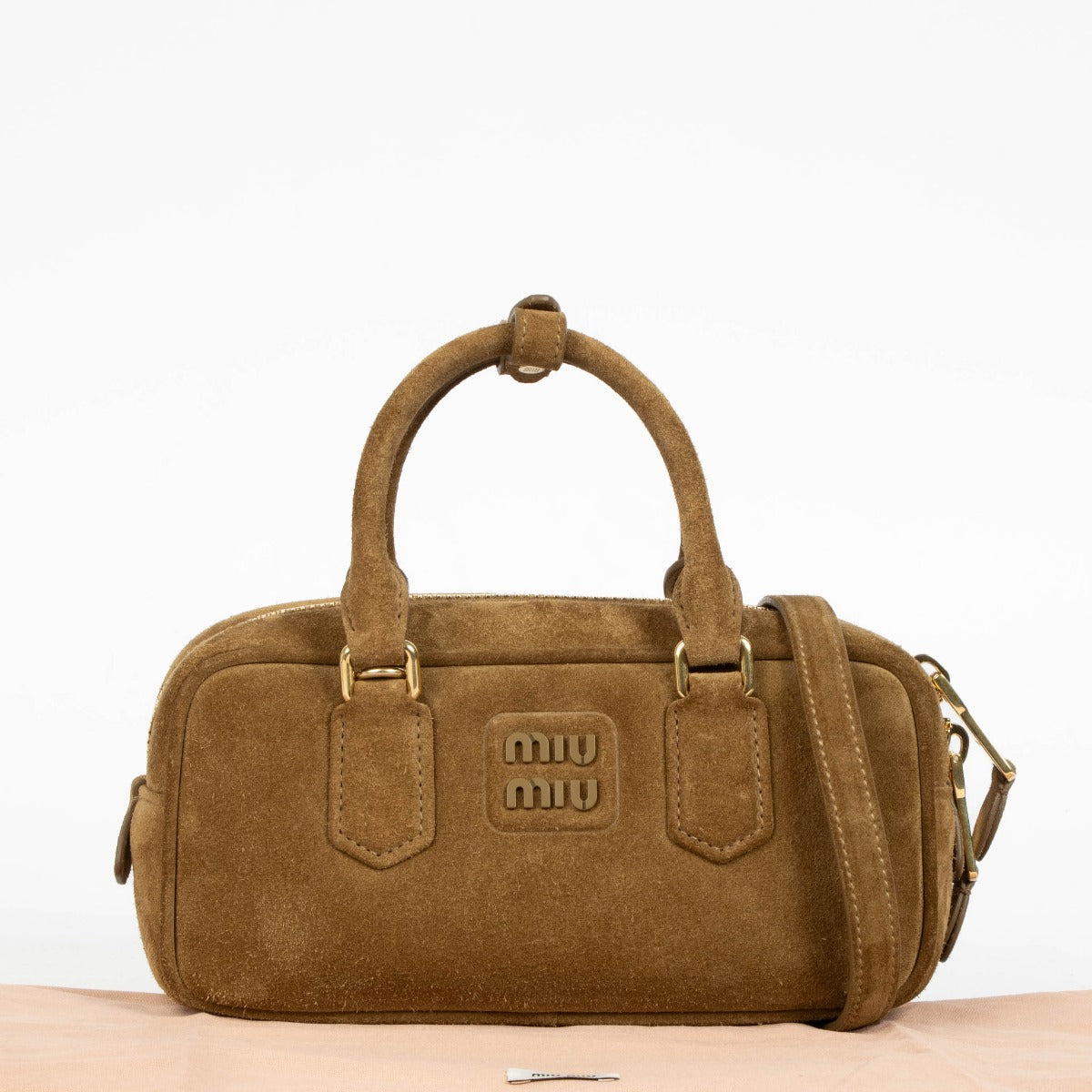 Authentic pre-loved Miu Miu Brown Suede Arcadie Top Handle Bag on Labellov.com