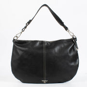 Shop the authentic Prada Black Vitello Daino Leather Shoulder Bag second hand on Labellov.com.