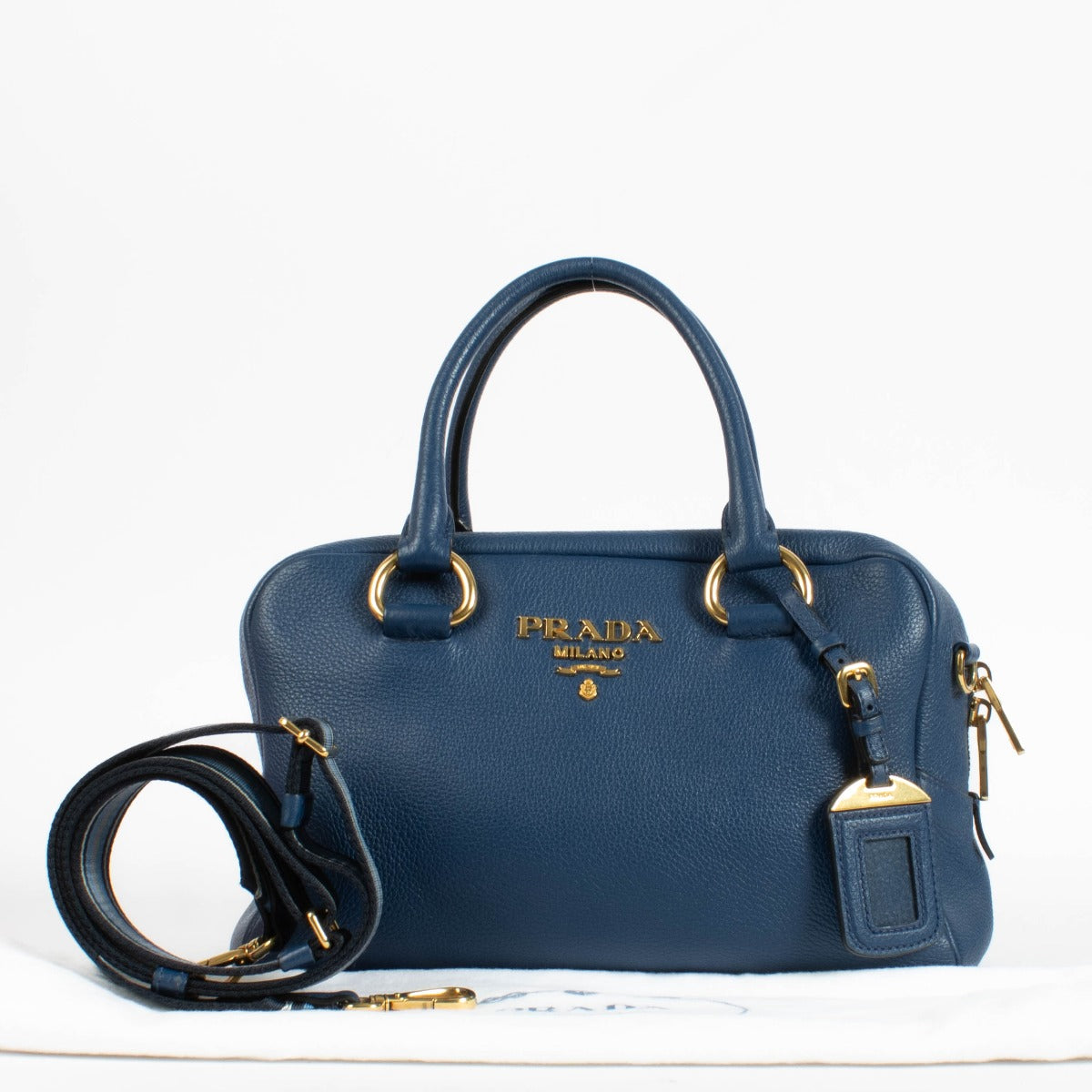 Authentic pre-loved Prada Blue Mini Vitello Phenix Bauletto Bag on Labellov.com