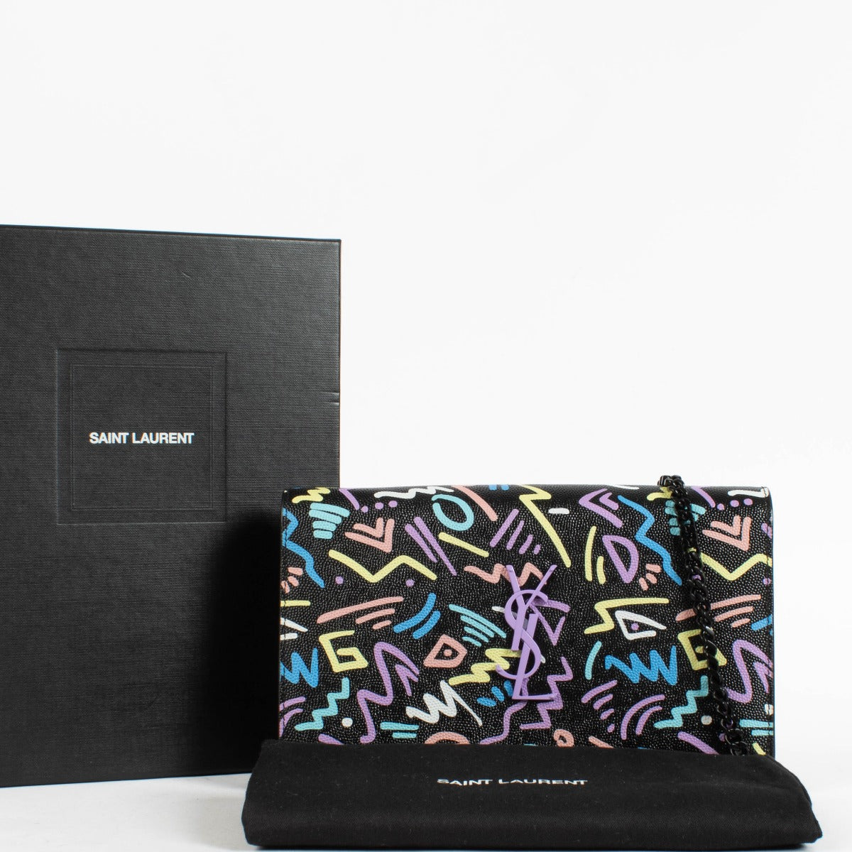 Authentic pre-loved Saint Laurent Black Grafitti Classic Cassandre Chain Wallet on Labellov.com