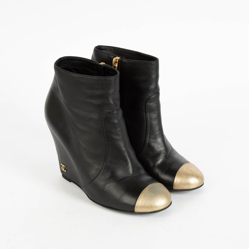 Shop the authentic Chanel Black/Gold Ankle Boots Size 37.5 on Labellov.com.