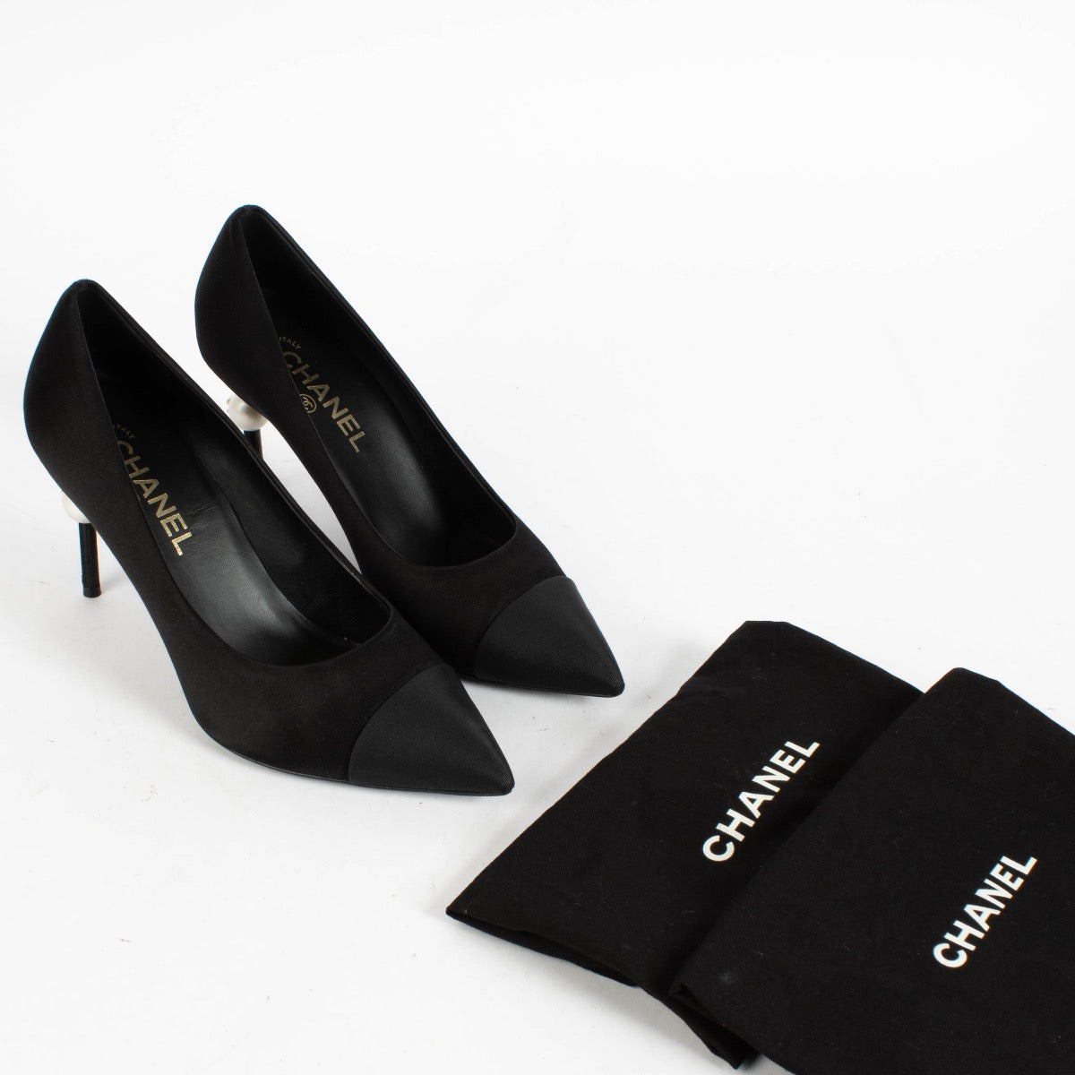 Shop the authentic Chanel Black Satin Pearl Heel Pumps Size 39 on Labellov.com.