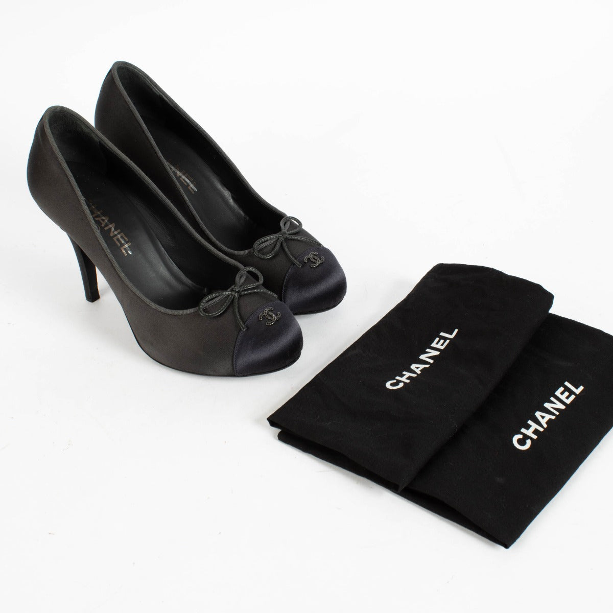Authentic pre-loved Chanel Black Satin Pumps - Size 39 on Labellov.com