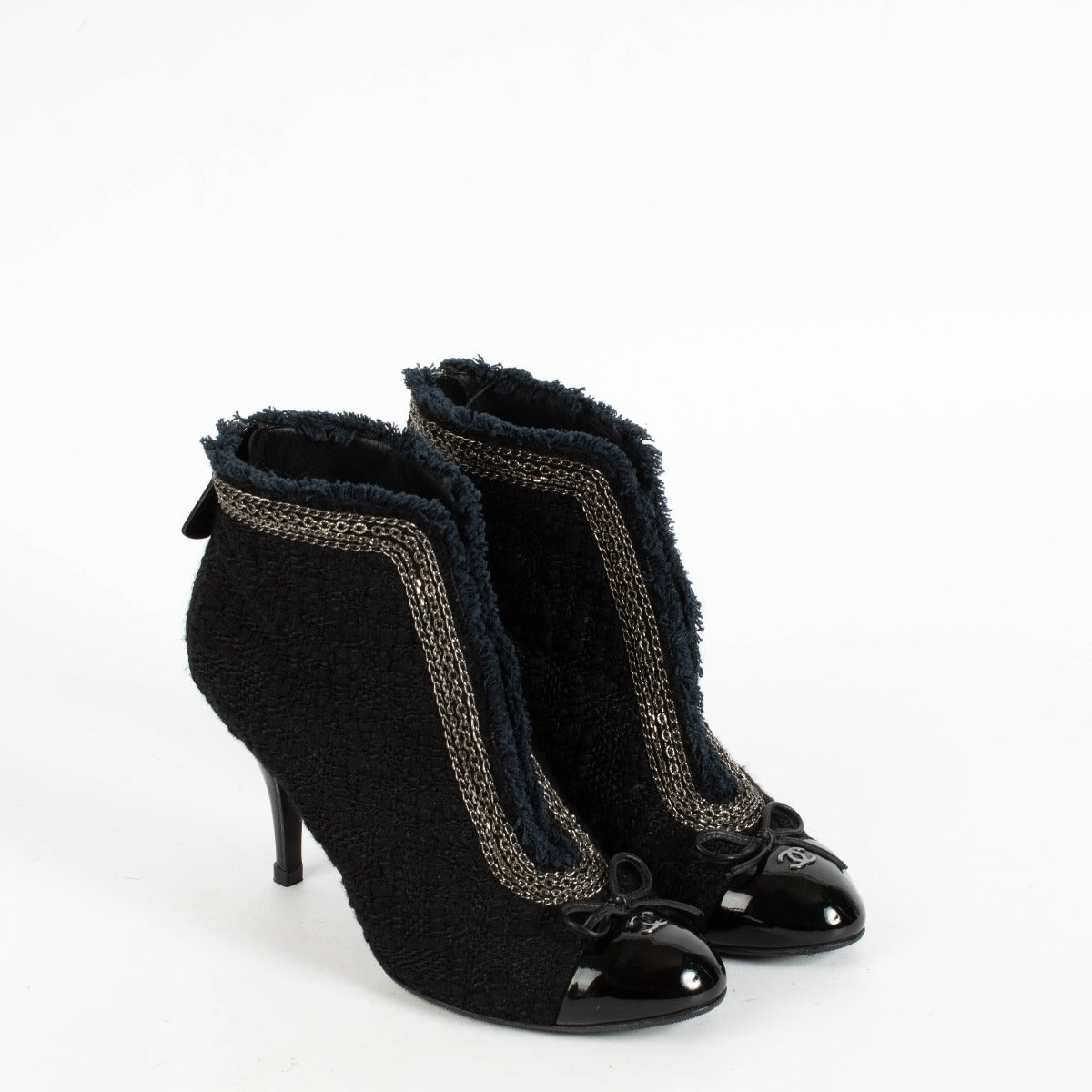 Shop the authentic Chanel Black Tweed Ankle Boots Size 37.5 on Labellov.com.