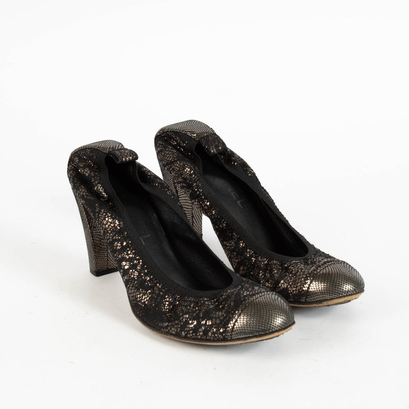 Shop the authentic Chanel Black Glitter Pumps Size 39 on Labellov.com.