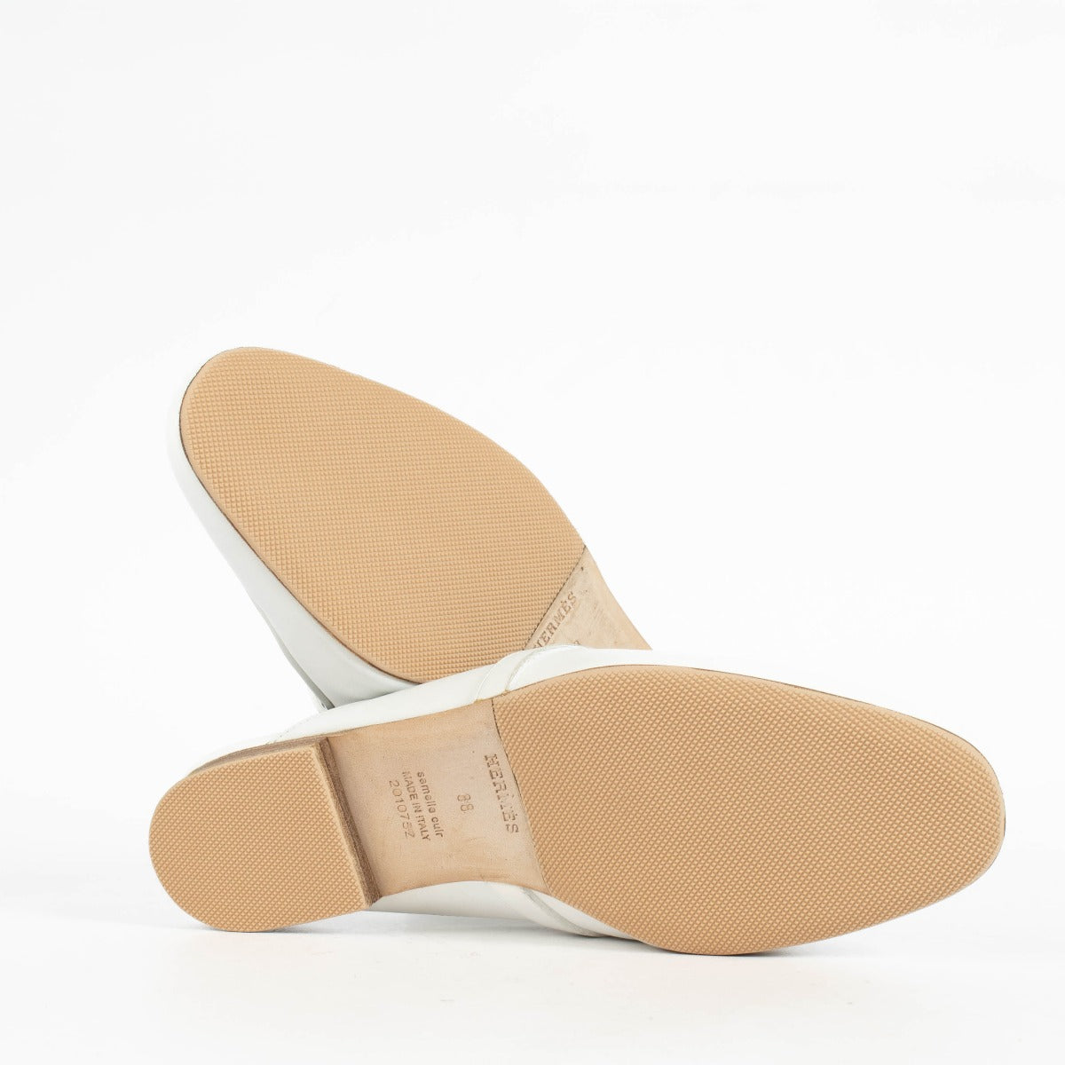 Shop the authentic Hermès White Oz Flats Size 39 on Labellov.com.
