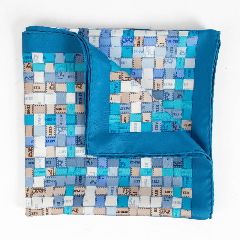 Are you looking for an authentic designer accessory? We buy and sell your preloved and brand new Hermès Blue Silk Bolduc Au Carré 90 Scarf.