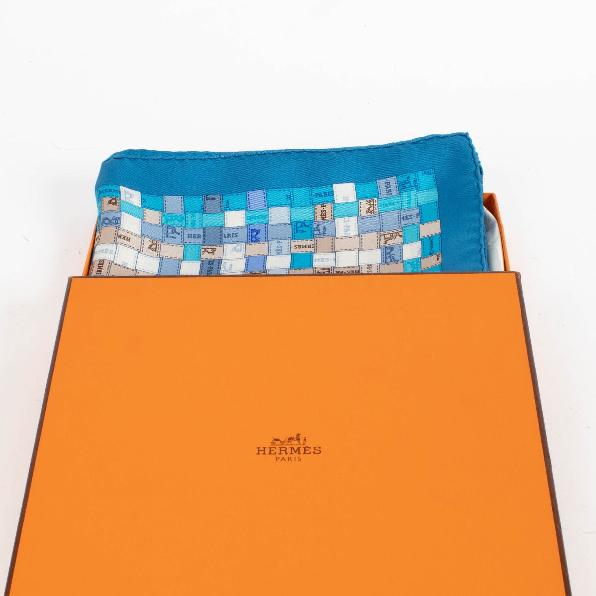Hermès Blue Silk Bolduc Au Carré 90 Scarf - for the best price at Labellov secondhand luxury in Antwerp and Knokke.