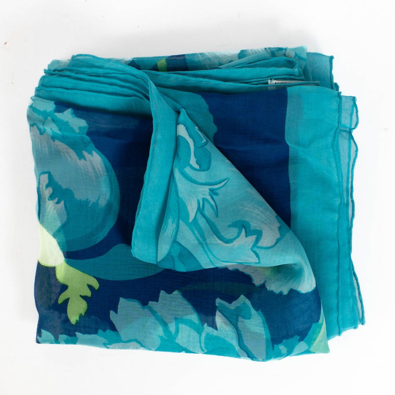 Are you looking for an authentic designer accessory? We buy and sell your preloved and brand new Hermès Blue Silk Mousseline Les Pivoines 140 Shawl.
