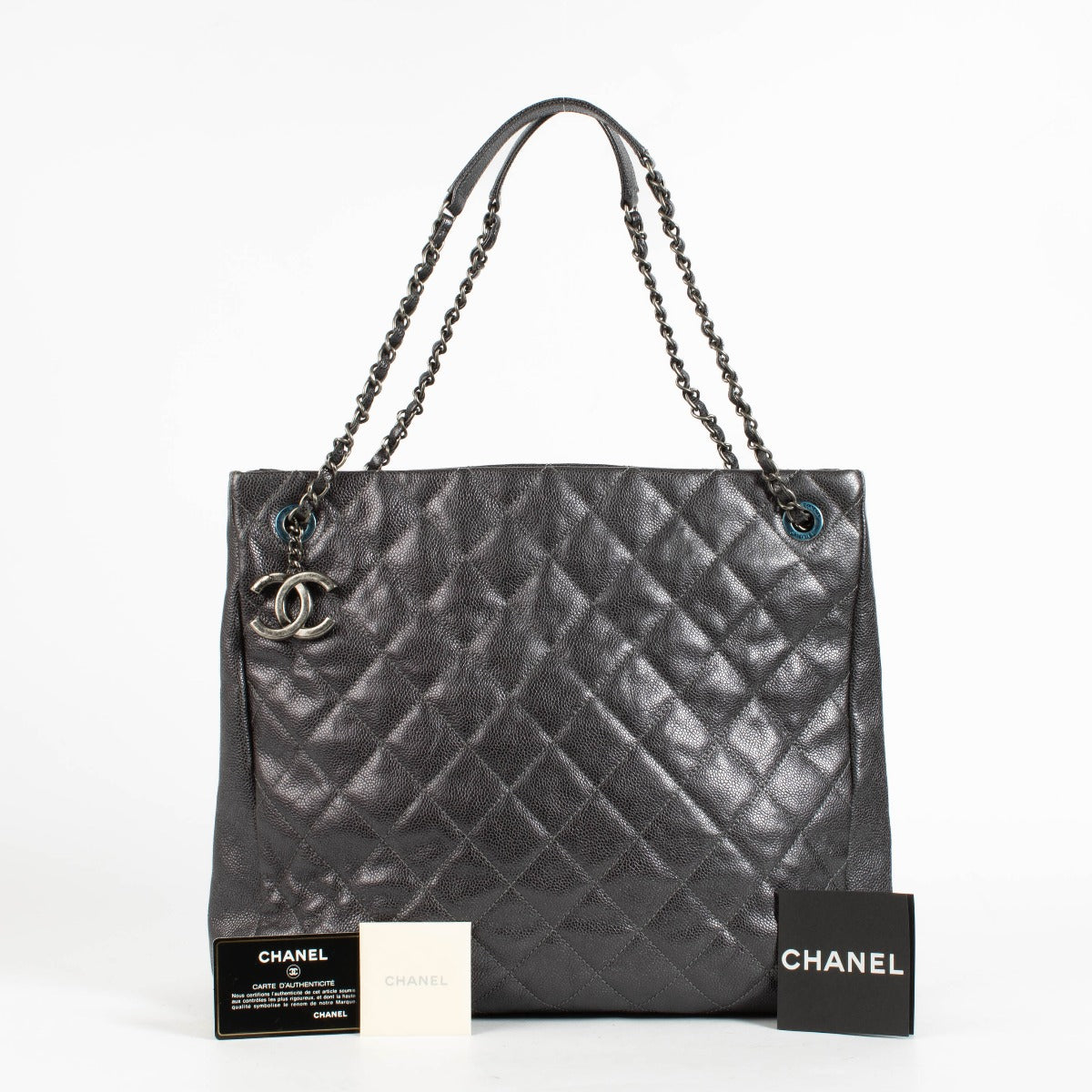 Authentic pre-loved Chanel Metallic Grey Quilted Caviar Leather Chic Shopper Tote on Labellov.com