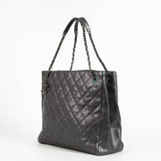 Authentic pre-loved Chanel Metallic Grey Quilted Caviar Leather Chic Shopper Tote on Labellov.com
