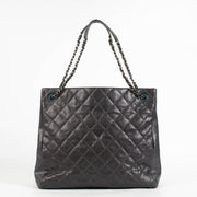 Authentic pre-loved Chanel Metallic Grey Quilted Caviar Leather Chic Shopper Tote on Labellov.com