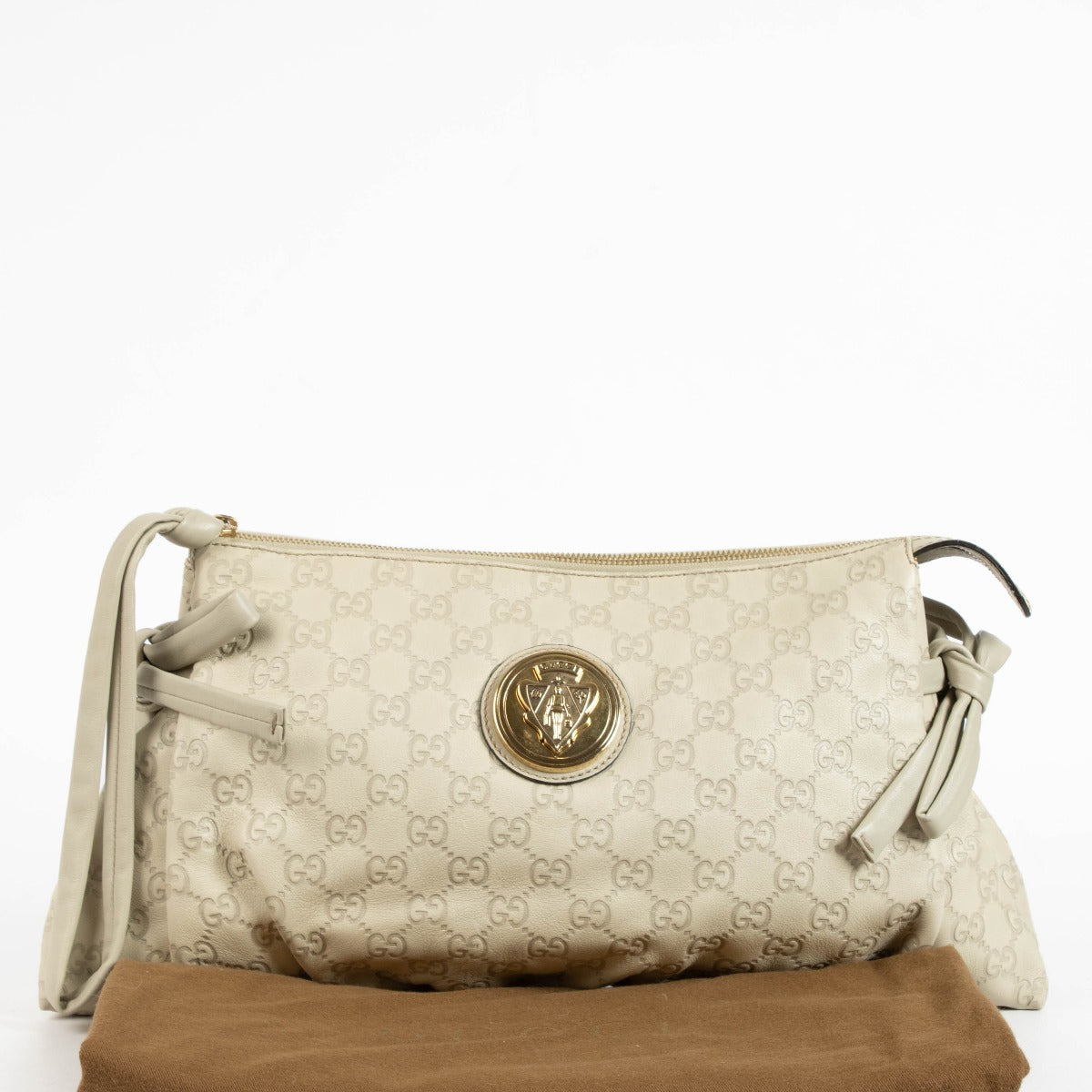 Authentic pre-loved Gucci Beige Leather Guccissima Large Hysteria Clutch on Labellov.com