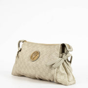 Authentic pre-loved Gucci Beige Leather Guccissima Large Hysteria Clutch on Labellov.com