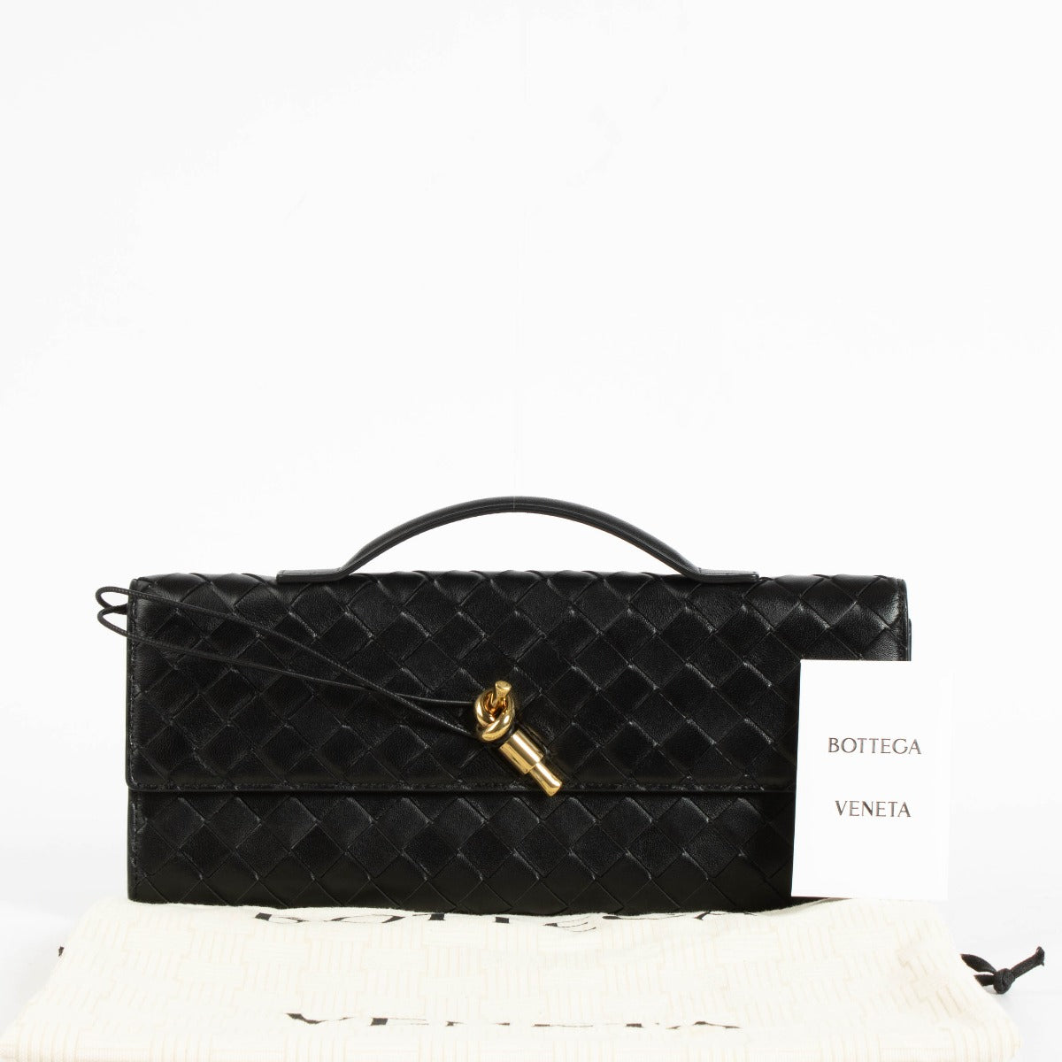 Authentic pre-loved Bottega Veneta Black Intrecciato Leather Andiamo Clutch on Labellov.com