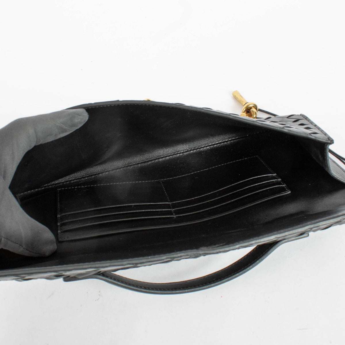 Authentic pre-loved Bottega Veneta Black Intrecciato Leather Andiamo Clutch on Labellov.com
