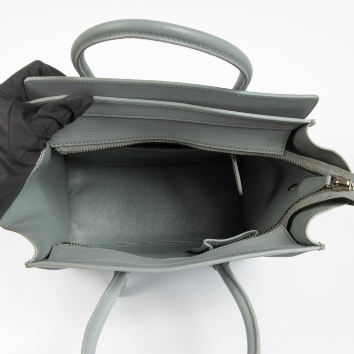 Shop this 100% authentic Celine Baby Blue Micro Luggage Top Handle Bag at Labellov.com