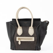 Authentic pre-loved Celine Black Leather Micro Luggage Top Handle Bag on Labellov.com