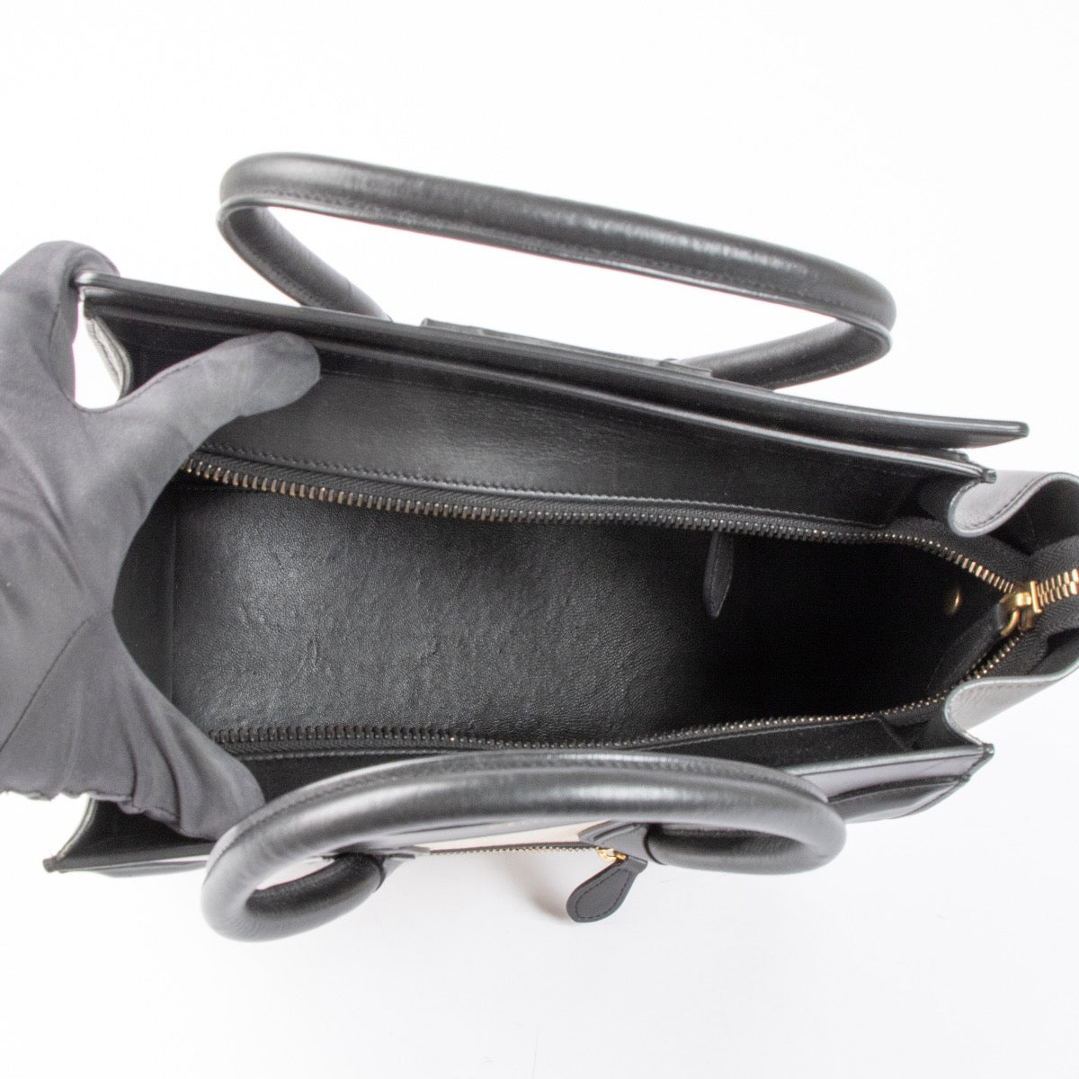 Authentic pre-loved Celine Black and Beige Leather Micro Luggage Top Handle Bag on Labellov.com