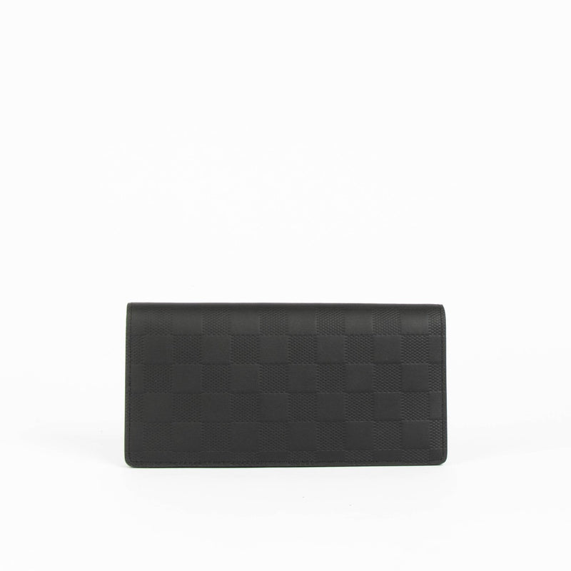 Shop this 100% authentic Louis Vuitton Black Damier Infini Brazza Wallet at Labellov.com
