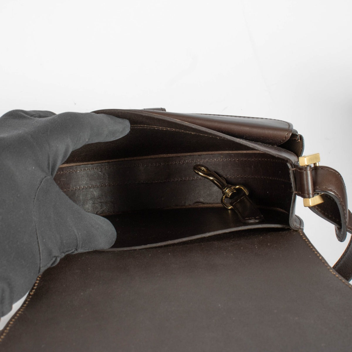 Authentic pre-loved Delvaux Chocolate Leather Brown Kate PM Crossbody Bag on Labellov.com.