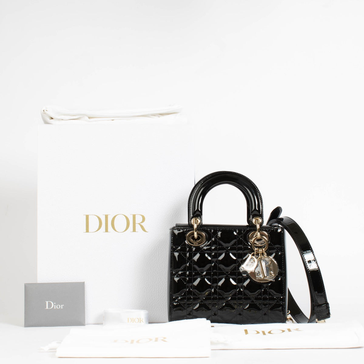 Authentic pre-loved Christian Dior Black Patent Leather Small Lady Dior Bag on Labellov.com