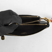 Authentic pre-loved Louis Vuitton Black Monogram Empreinte Crafty Pochette Duo Wallet on Labellov.com