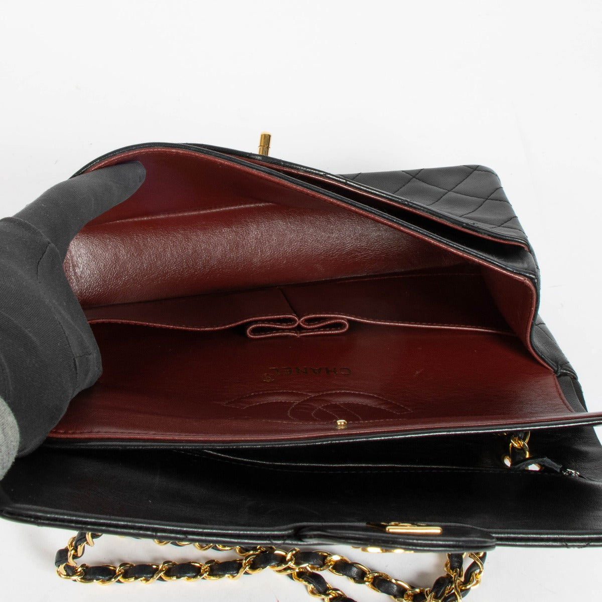 Shop this authentic Chanel Vintage Black Lambskin Medium Classic Handbag pre-loved on Labellov.com