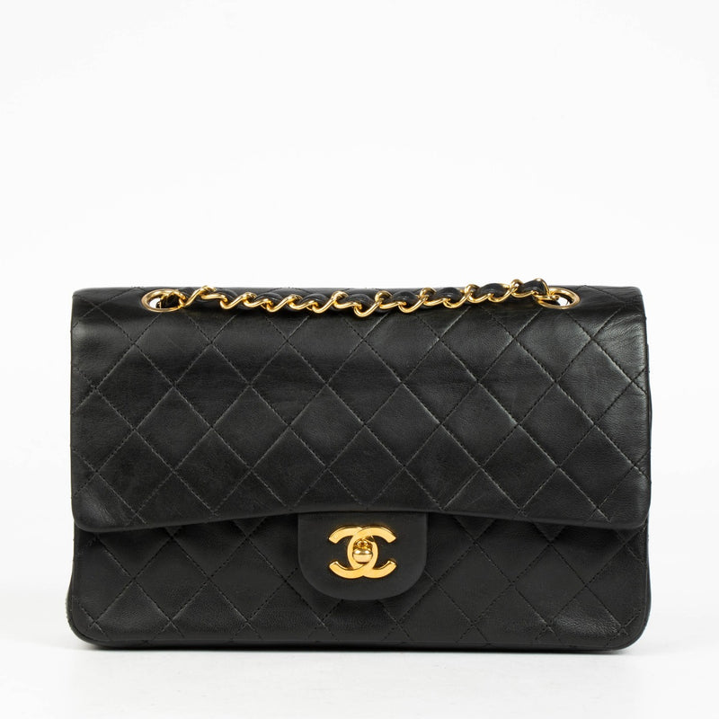 Shop this authentic Chanel Vintage Black Lambskin Medium Classic Handbag pre-loved on Labellov.com