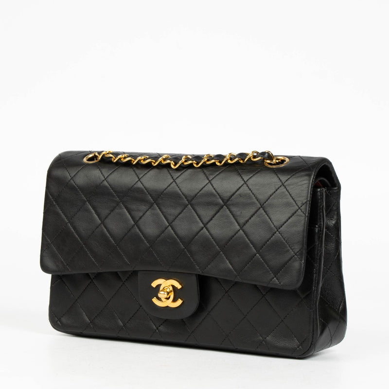 Shop this authentic Chanel Vintage Black Lambskin Medium Classic Handbag pre-loved on Labellov.com