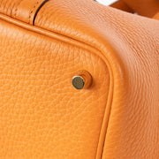authentic preloved Hermès Picotin Lock 18 Orange Clemence GHW on Labellov.com