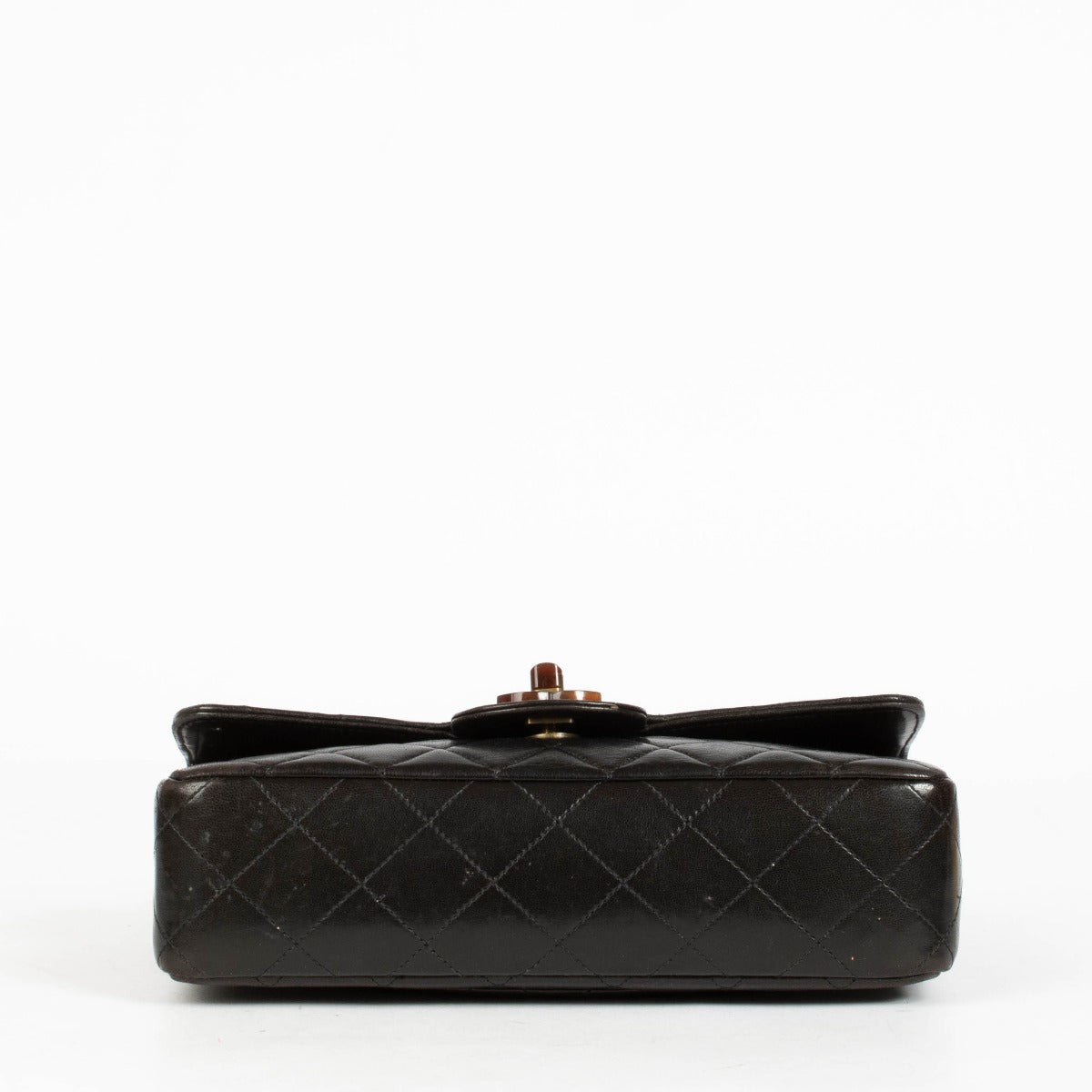 Authentic pre-loved Chanel Black Tortoiseshell Small Classic Flap Bag on Labellov.com