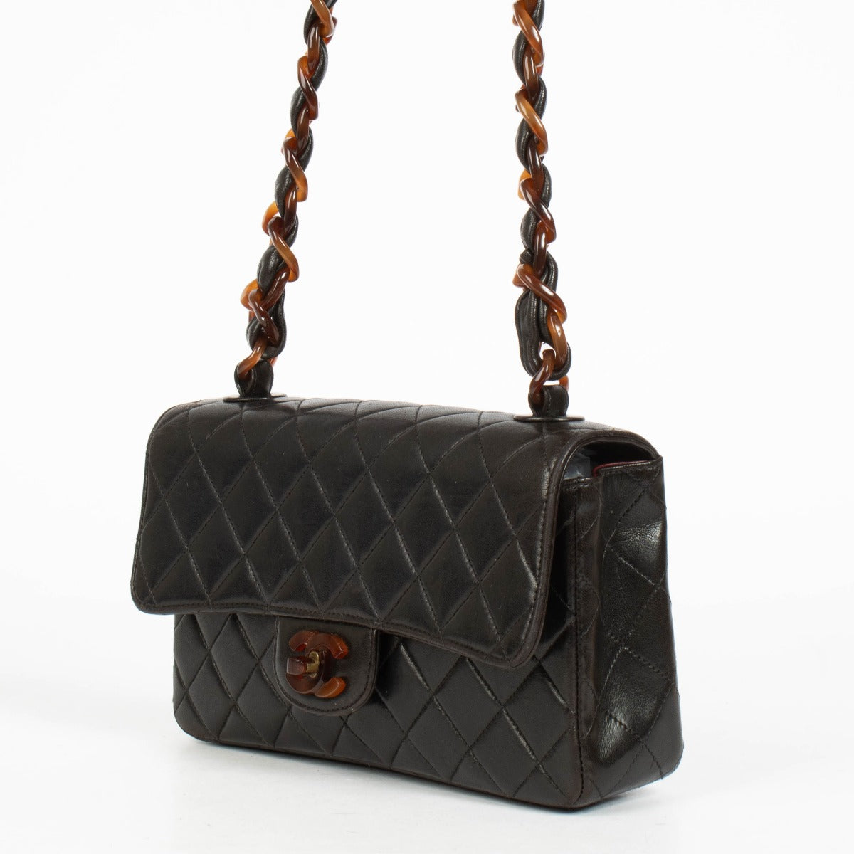 Authentic pre-loved Chanel Black Tortoiseshell Small Classic Flap Bag on Labellov.com